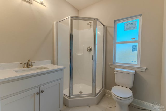 bathroom featuring a shower with door, vanity, and toilet