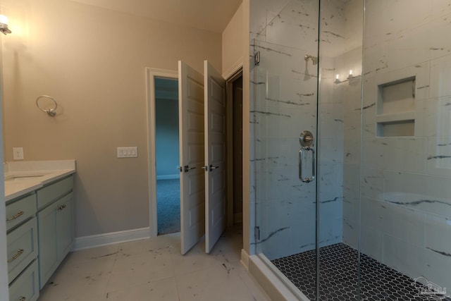 bathroom featuring vanity and walk in shower