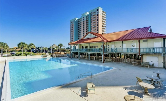 view of pool with a patio