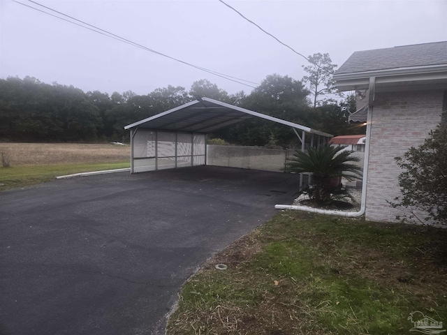 view of car parking with a carport