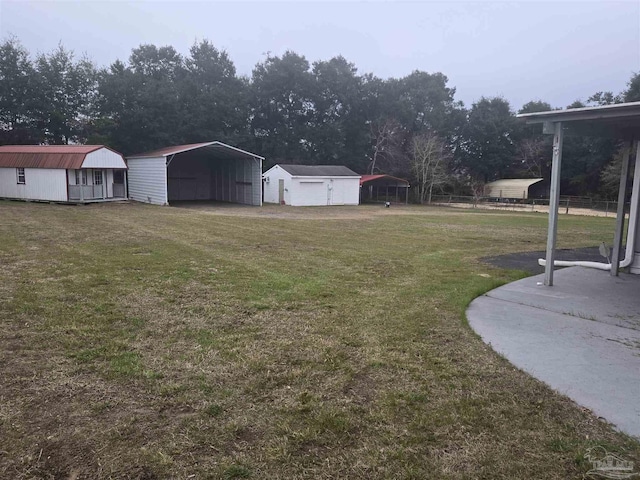 view of yard with a carport