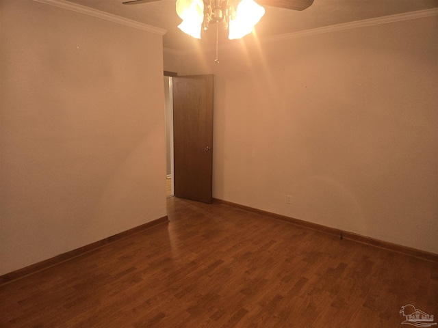 unfurnished room featuring dark hardwood / wood-style flooring, ceiling fan, and ornamental molding