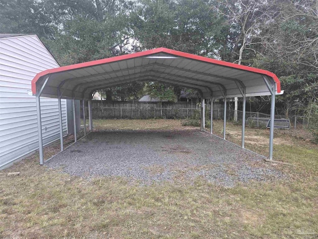 view of vehicle parking with a carport