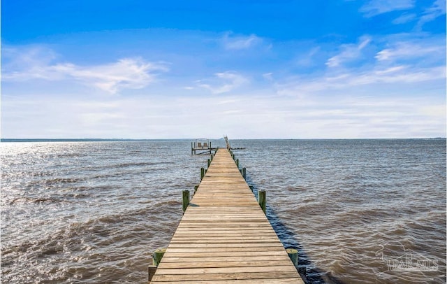 view of dock with a water view