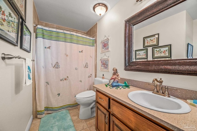 bathroom with tile patterned flooring, curtained shower, toilet, and vanity