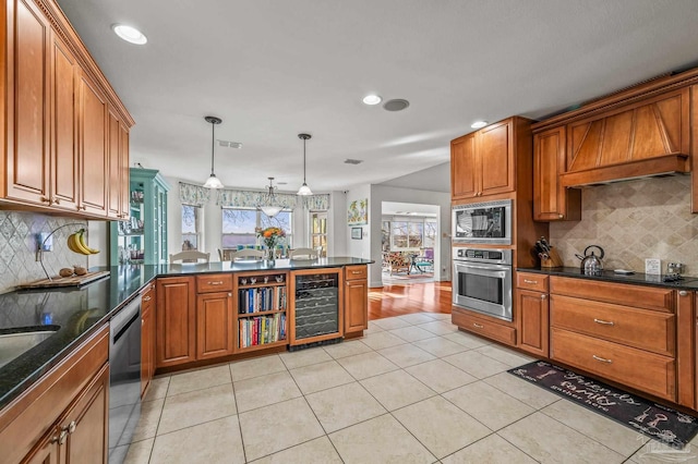 kitchen with visible vents, wine cooler, light tile patterned floors, brown cabinets, and black appliances