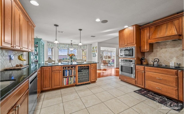 kitchen with visible vents, brown cabinets, black appliances, wine cooler, and light tile patterned floors