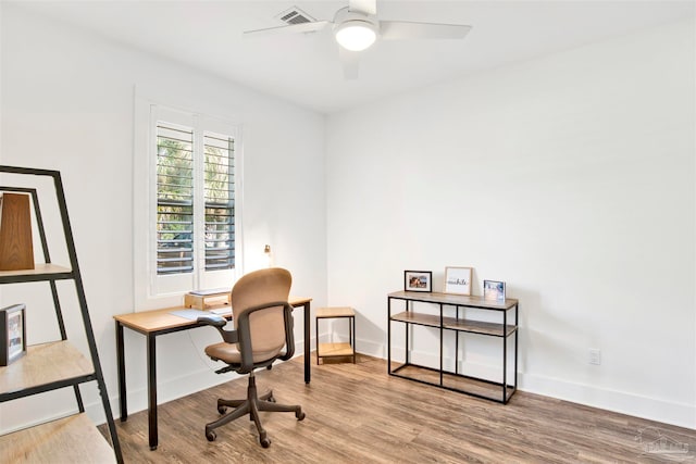 office area with ceiling fan and hardwood / wood-style floors