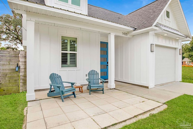 view of patio / terrace with a garage