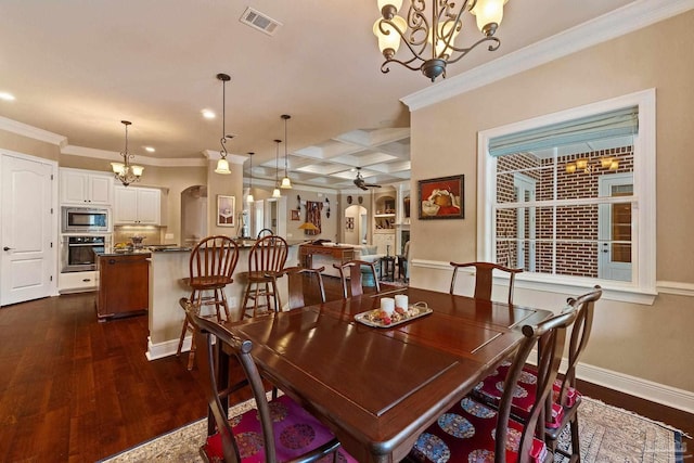 dining room featuring beamed ceiling, dark wood-type flooring, ceiling fan with notable chandelier, crown molding, and coffered ceiling