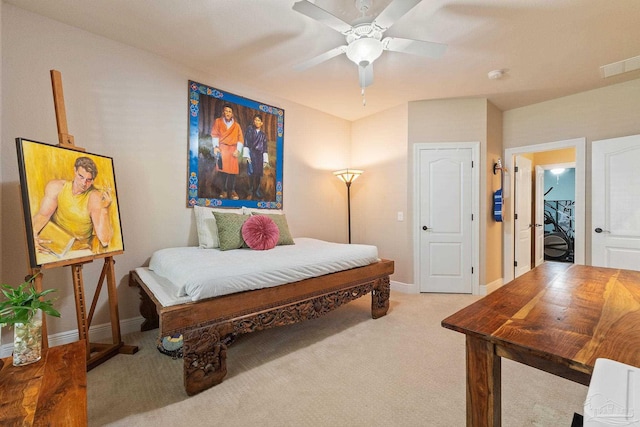 bedroom with ceiling fan and carpet