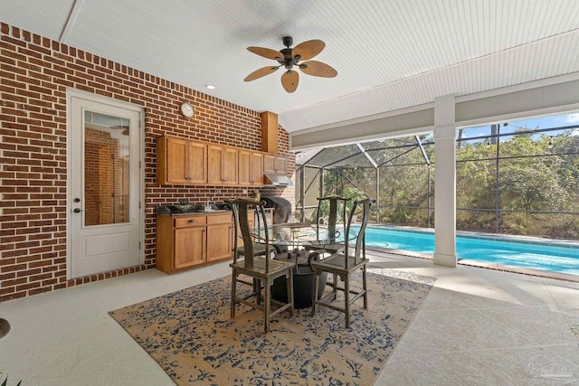 exterior space with ceiling fan