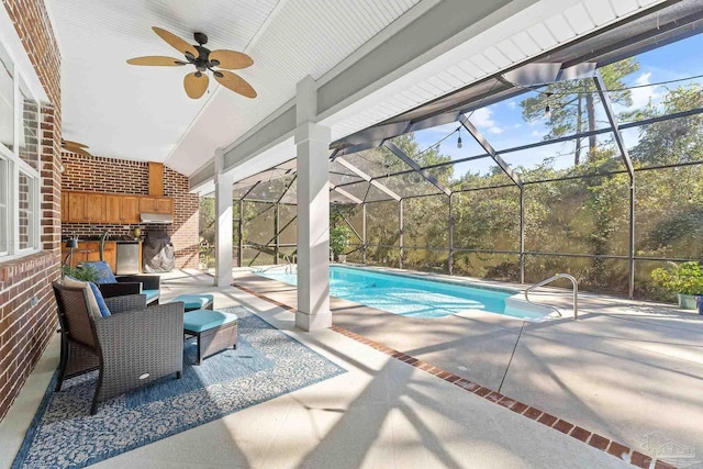 view of pool featuring an outdoor living space, a patio area, glass enclosure, and ceiling fan