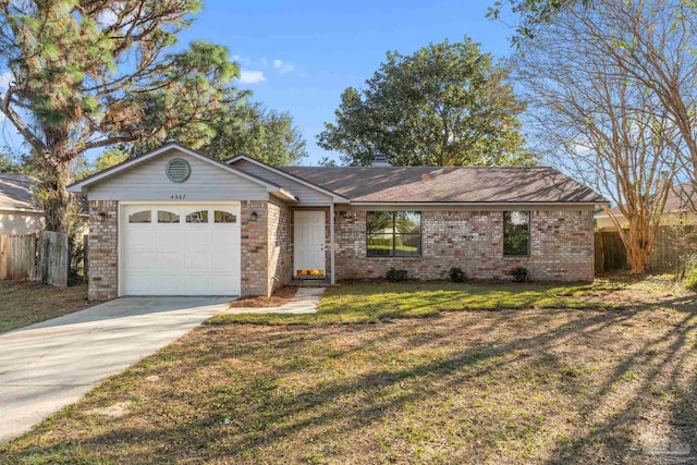 ranch-style house featuring a front yard and a garage