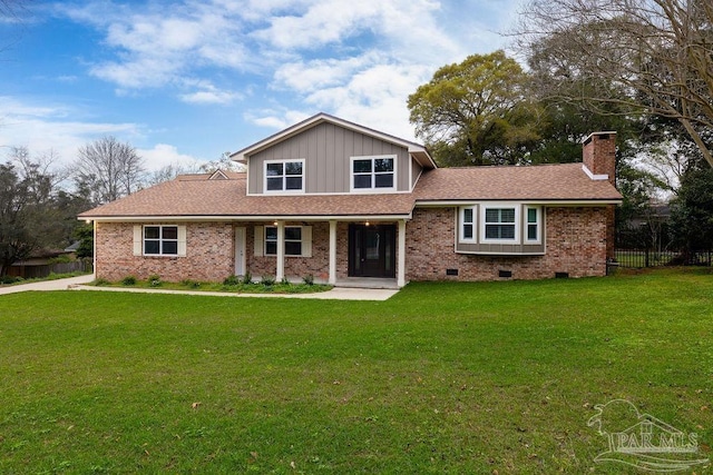 view of front facade with a front yard