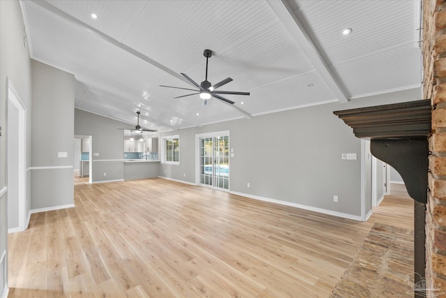 unfurnished living room with ceiling fan, light hardwood / wood-style flooring, and lofted ceiling