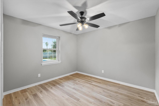 spare room with ceiling fan and light hardwood / wood-style flooring