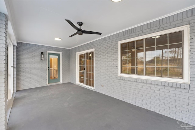 view of patio featuring ceiling fan