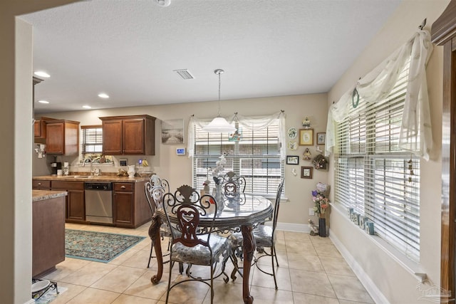 3288 Wasatch Range Loop, Pensacola, FL 32526 - dining room with light tile patterned flooring, baseboards, and recessed lighting