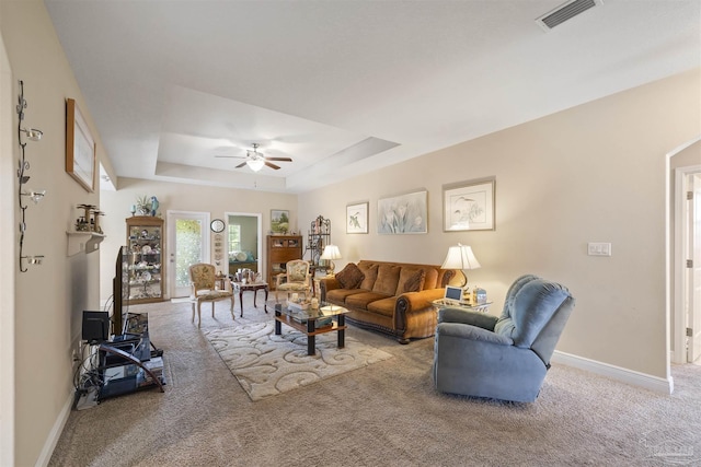 3288 Wasatch Range Loop, Pensacola, FL 32526 - carpeted living room with a raised ceiling, ceiling fan, and baseboards
