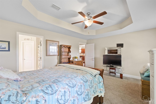 3288 Wasatch Range Loop, Pensacola, FL 32526 - bedroom featuring a raised ceiling, carpet, baseboards, and a ceiling fan