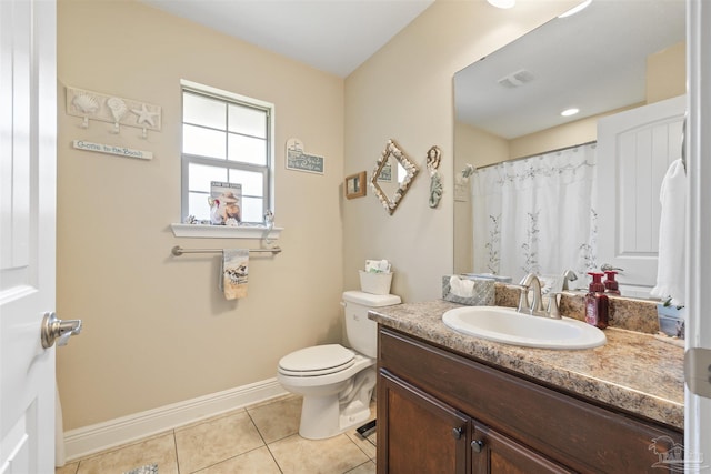 3288 Wasatch Range Loop, Pensacola, FL 32526 - full bathroom with tile patterned flooring, toilet, baseboards, vanity, and curtained shower