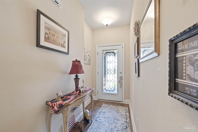 3288 Wasatch Range Loop, Pensacola, FL 32526 - foyer entrance featuring wood finished floors and baseboards