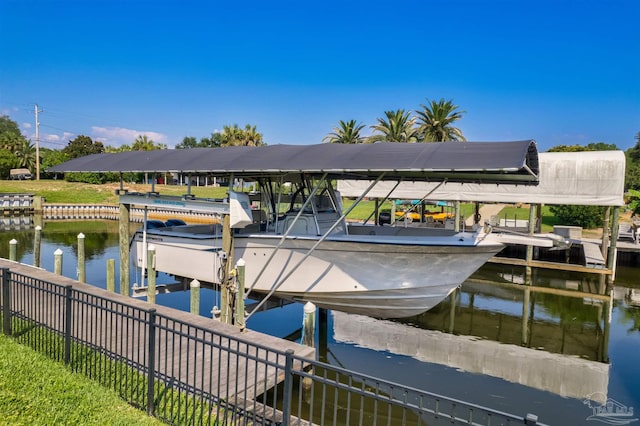 dock area with a water view