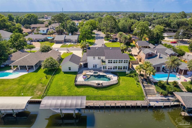 bird's eye view with a water view