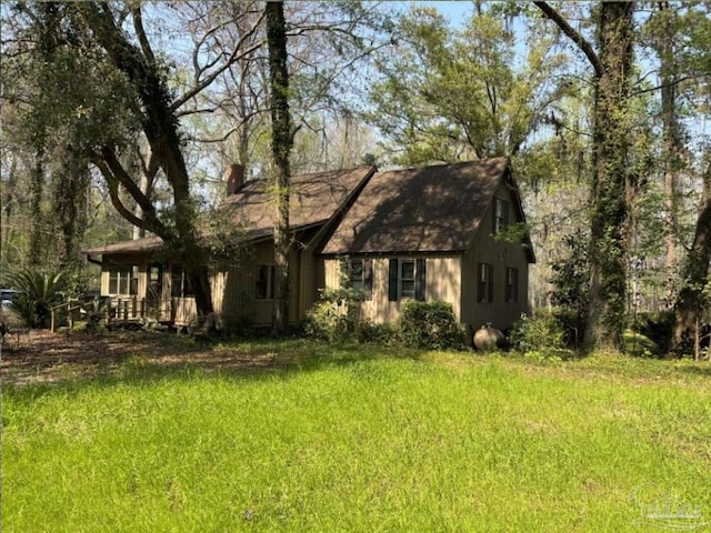 5301 Gentle Breeze Dr, Tallahassee, FL 32317 - view of side of home featuring a chimney