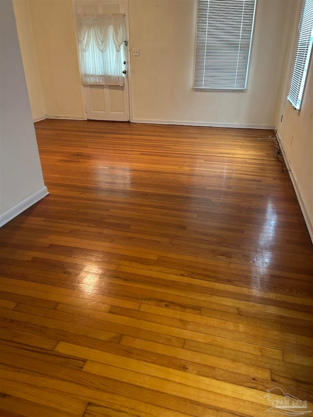 interior space with hardwood / wood-style flooring