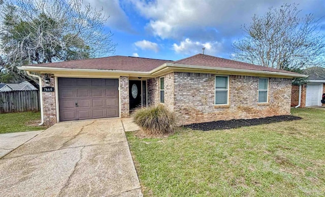 ranch-style home featuring brick siding, concrete driveway, fence, a garage, and a front lawn