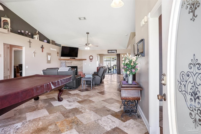 playroom featuring visible vents, a fireplace, high vaulted ceiling, billiards, and a ceiling fan