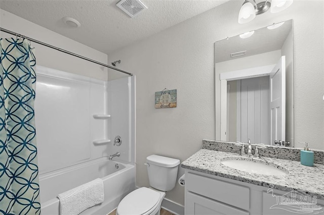 full bathroom with a textured ceiling, toilet, vanity, visible vents, and shower / tub combo with curtain