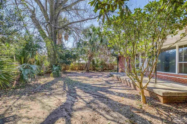 view of yard with fence