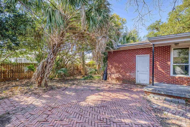 view of patio with fence