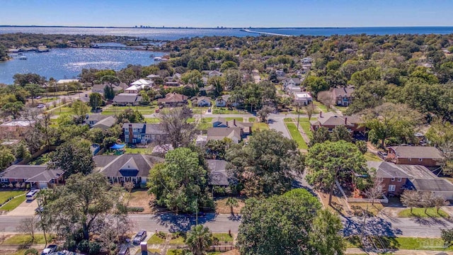 birds eye view of property featuring a water view and a residential view