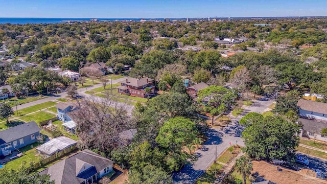 birds eye view of property featuring a water view and a residential view