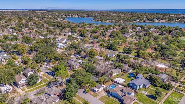 aerial view featuring a residential view and a water view