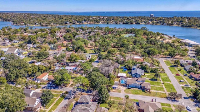 bird's eye view featuring a water view and a residential view