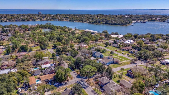 bird's eye view featuring a water view and a residential view