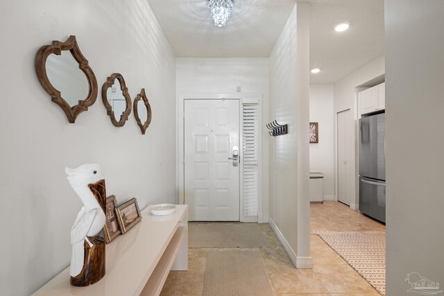 8501 Gulf Blvd Unit 3B, Navarre Beach, FL 32566 - foyer featuring recessed lighting and light tile patterned floors