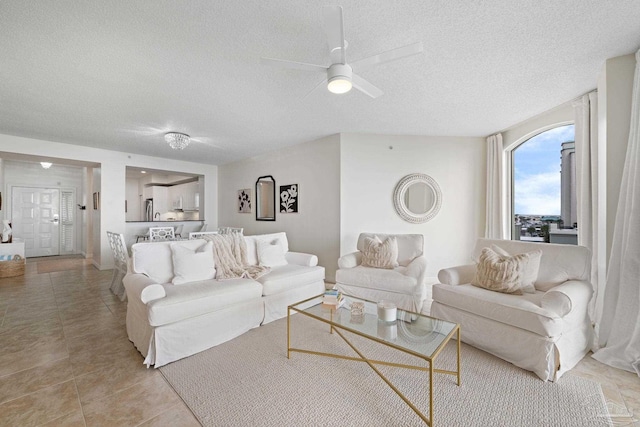 8501 Gulf Blvd Unit 3B, Navarre Beach, FL 32566 - living area with a textured ceiling and ceiling fan