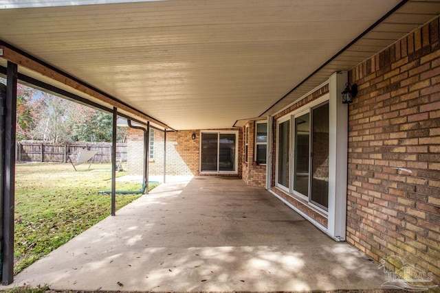 view of patio featuring fence