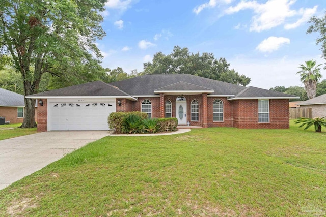 ranch-style home featuring brick siding, driveway, a front lawn, and a garage