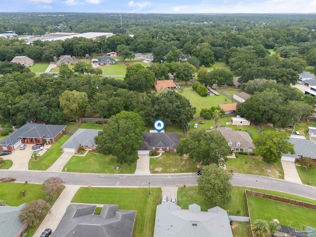 bird's eye view featuring a residential view and a view of trees