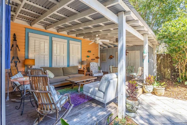 view of patio / terrace featuring an outdoor hangout area, ceiling fan, and fence