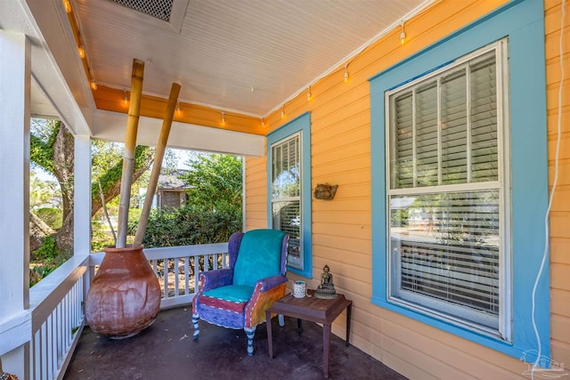 exterior space featuring visible vents and a porch