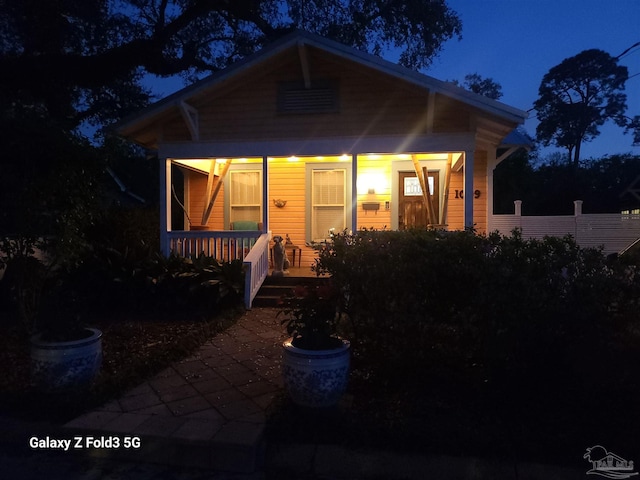 bungalow-style home with a porch