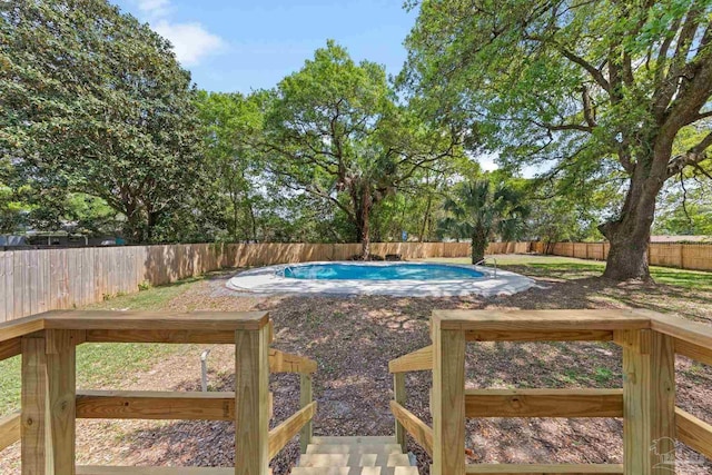 view of swimming pool with a fenced in pool and a fenced backyard